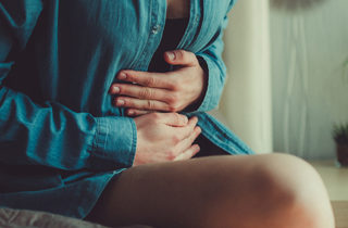 Types of PCOS, What is PCOS and can it be cured, woman with menstrual pain and PCOS symptoms, period