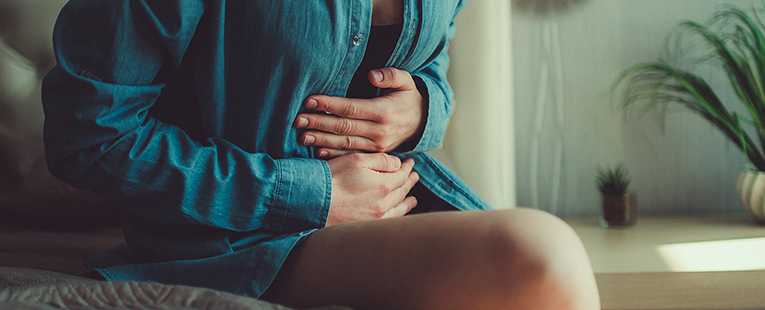 Types of PCOS, What is PCOS and can it be cured, woman with menstrual pain and PCOS symptoms, period