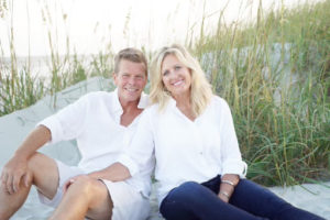 Misty Barnes posing on the beach with her loved one.